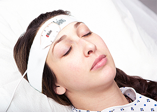 patient wearing tfa-1 sensor on forehead